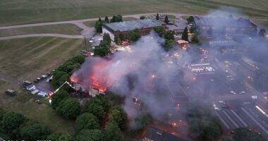 The inferno at the 444-acre automotive complex in Bicester, Oxfordshire