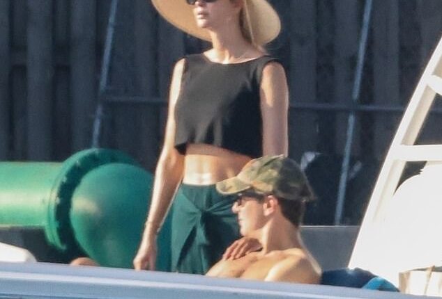 Ivanka Trump flaunted her toned stomach in a tiny crop top as she enjoyed a boat ride with her family ahead of Memorial Day