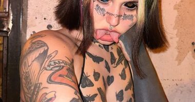 An influencer has who has spent nearly $70,000 on body modifications has revealed that haters now say she looks like a demon... but she has no regrets