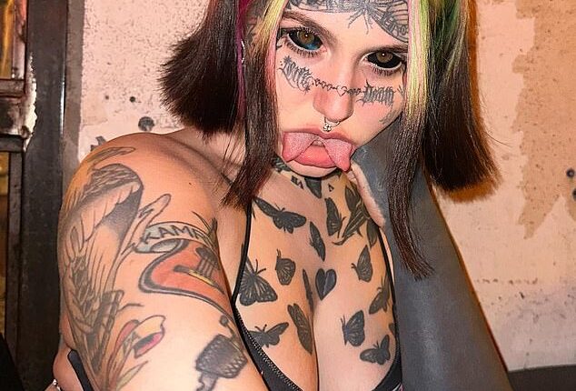 An influencer has who has spent nearly $70,000 on body modifications has revealed that haters now say she looks like a demon... but she has no regrets