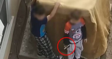 New Mexico police officers were forced to confront two young boys aged just seven and nine-years-old after they refused to drop a handgun