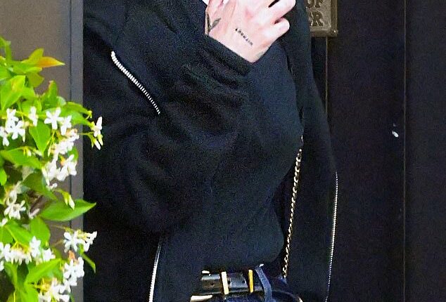 Kelly Osbourne showcased her slender frame in blue denim jeans on Thursday as she headed out for dinner with pals in West Hollywood