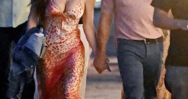Lauren Sanchez nearly spilled out of her plunging dress as she stepped out in Italy with her fiancé Jeff Bezos and son Nikko Gonzalez on Tuesday evening