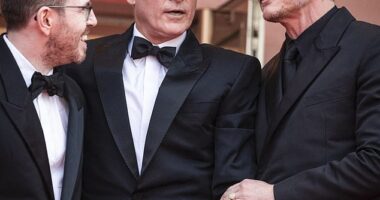 A lip reader has explained what Pedro Pascal told Joaquin Phoenix after he pulled down the actor's waving hand while on the red carpet of the Cannes Film Festival