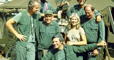 Loretta Swit pictured above surrounded by her  M*A*S*H* cast members, from left: Mike Farrell, William Christopher, Harry Morgan, Alan Alda, Jamie Farr, and David Ogden Stiers
