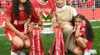 Mo Salah is pictured with his wife Magi Salah and their children Makka (left) and Kayan (right) on Sunday as Liverpool celebrates winning the Premier League