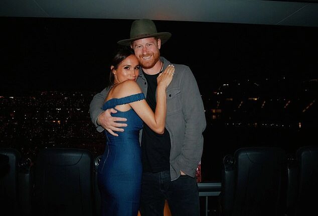 Meghan Markle and Prince Harry were spotted enjoying the fifth night of Beyoncé¿s Cowboy Carter Tour in California on Friday in a sweet behind-the-scenes snap