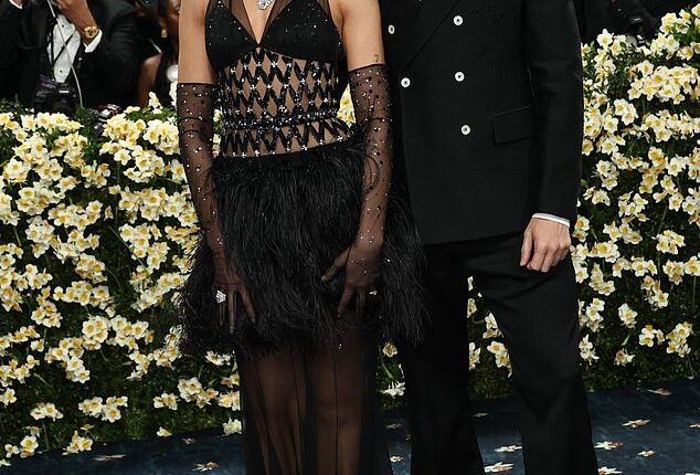 Dua Lipa looked more loved-up than ever with fiancé Callum Turner as they made their red carpet debut at the 2025 Metropolitan Museum of Art's Costume Institute Benefit Gala on Monday