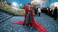 Teyana Taylor arrived in a burgundy and black suit and cape