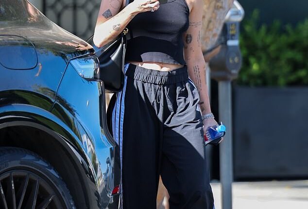 Miley Cyrus, 32, cut a casual figure in a trendy crop top as she was seen for the first time since she revealed her traumatising emergency health scare