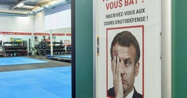 A French gym has put up this poster of Emmanuel Macron's bloody face to advertise its self defence classes. The text reads: 'Wife beating you? Join our self-defence classes!'