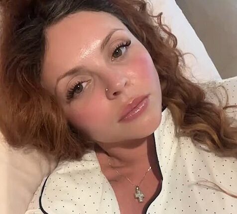 Hospitalised Jesy Nelson, 33, has asked her loyal fans for some advice on what colour to dye her hair after undergoing surgery to save her unborn twins