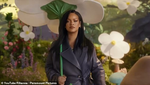 Rihanna fans have now turned on the singer as they share their furious reactions to her 'horrible,' 'god awful,' 'garbage' new song Friend Of Mine; pictured in the music video