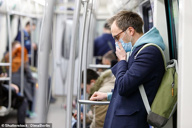 Pictured above is a man wearing a face mask. China has been ordered to pay $24billion to Missouri for hoarding PPE