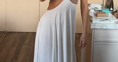 Rosie Huntington-Whiteley flaunted her incredible physique in a £1,950 Maison Alaia suspender skirt and crop top combination for her Instagram photo dump on Friday