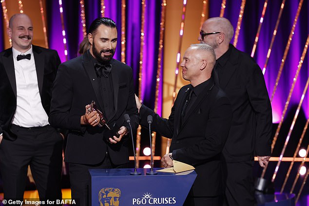 Rylan Clark (left) emotionally shared a heartbreaking divorce confession at the BAFTA TV Awards after he scooped a win with Robert Rinder (right)