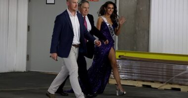 Bill Belichick was stony-faced as he and Jordon Hudson were led to their car by security