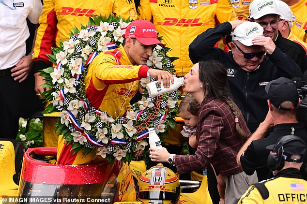 Chip Ganassi Racing driver Alex Palou (10) of Spain celebrates with his family in the winner's circle after winning the 109th Running of the Indianapolis 500 at Indianapolis Motor Speedway