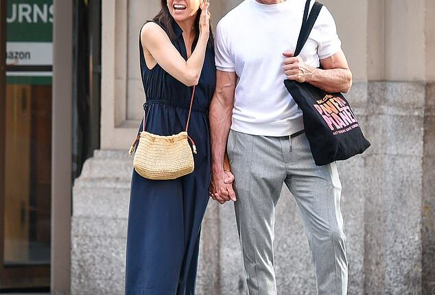 Hugh Jackman and his girlfriend Sutton Foster put on a loved-up display as they enjoyed a romantic walk in New York City on Saturday