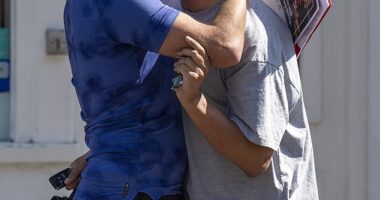 TOWIE's Junaid Ahmed and boyfriend Joe Blackman looked happier than ever as they picked up the keys to their first home in Essex on Friday