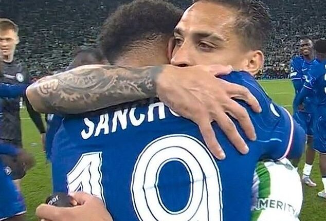 Jadon Sancho embraces fellow Man United loanee Antony minutes after the final whistle