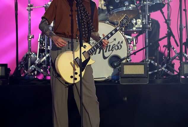 The BBC 's VE Day 80th Anniversary celebration saw an unlikely addition to its lineup on Thursday, as iconic rock band The Darkness took to the stage