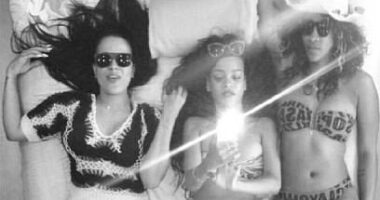 Buried in an evidence file that was submitted to the court is this photo of Rihanna (center), Serena Williams (right) and an unidentified woman believed to be Diddy's former assistant, Capricorn Clark. They are posing beneath a mirrored ceiling on a bed in July 2012