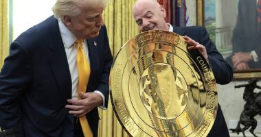 Infantino shows Trump the new Club World Cup trophy in the Oval Office back in March