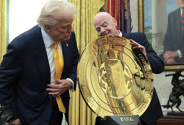 Infantino shows Trump the new Club World Cup trophy in the Oval Office back in March