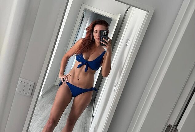 Una Healy, 43, sent temperatures soaring as she posed for a sexy mirror-selfie snap in a tiny blue bikini on Instagram on Monday