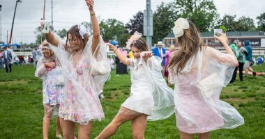 Kentucky Derby guests were seen getting a little rowdy ahead of the coveted horse race... as they arrived in extravagant dresses and enormous hats