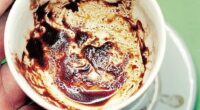Reading the remnants of a cup of coffee is a method of divination known as tasseography, and is usually carried out by fortune tellers - not ChatGPT