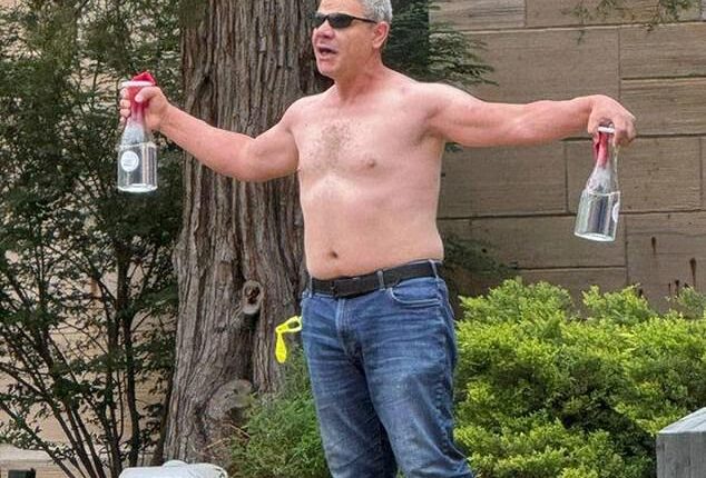 Horrifying video also showed the suspect, a middle-aged man, holding bottles of what appeared to be alcohol for the Molotov cocktails as he shouted at bystanders