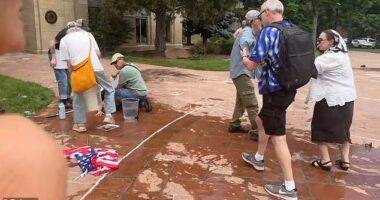 Shocking video and images from the scene showed several victims laying motionless on the ground beside Israel flags as witnesses rushed to pour water on their wounds