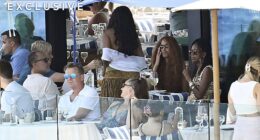 Michelle Obama and her daughters were pictured enjoying lunch at an exclusive club on the idyllic Spanish island of Mallorca.