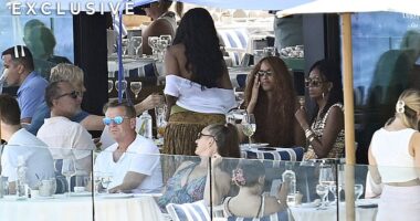 Michelle Obama and her daughters were pictured enjoying lunch at an exclusive club on the idyllic Spanish island of Mallorca.