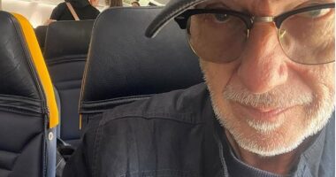 An 80s pop icon who penned a classic Christmas song looked totally unrecognisable as he was pictured hopping on a Ryanair flight this week