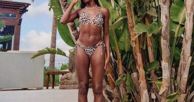 AJ Odudu, 37, sent temperatures soaring in a skimpy bikini as she posed for a slew of sizzling snaps from her lavish holiday in Ibiza, Spain