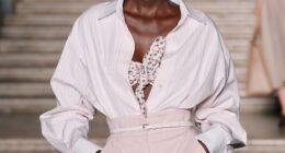 A model walks the runway during the Max Mara Cruise fashion show on June 17