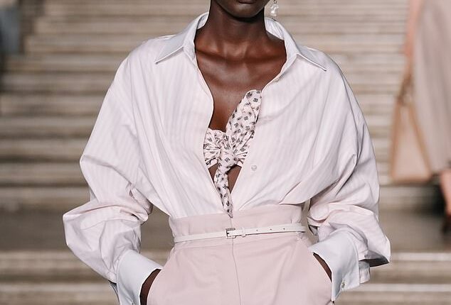 A model walks the runway during the Max Mara Cruise fashion show on June 17