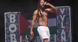 In an astonishing dereliction of duty, the BBC did not pull the plug on punk duo Bob Vylan (frontman Bobby Vylan pictured during their Glastonbury set) as they embarked on an anti-Semitic rant, writes Leo McKinstry