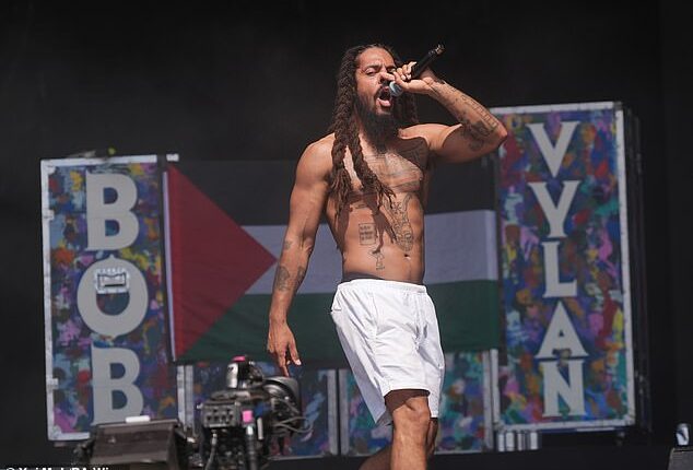In an astonishing dereliction of duty, the BBC did not pull the plug on punk duo Bob Vylan (frontman Bobby Vylan pictured during their Glastonbury set) as they embarked on an anti-Semitic rant, writes Leo McKinstry