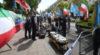 Officers and paramedics swooped on Princes Gate, Knightsbridge, scrambling to detain suspects and treat the injured activists
