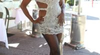 Suzan Mutesi rang in her 39th birthday in dazzling style, turning heads in a barely-there silver mini dress as she partied with a surprising mix of reality TV stars