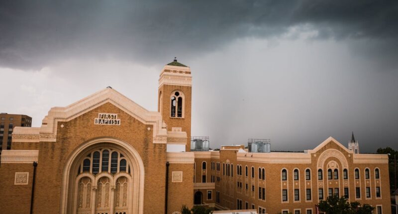 a brown First Baptist Church building