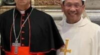 Bishop Michael Pham (right) of the Diocese of San Diego poses for a photo with then Cardinal Robert Francis Prevost before he became Pope Leo. The pontiff elevated Pham to the position of bishop in May