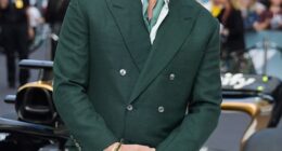 Brad Pitt looked dapper as he stepped out in a dark green suit for the European premiere of F1: The Movie in London on Monday