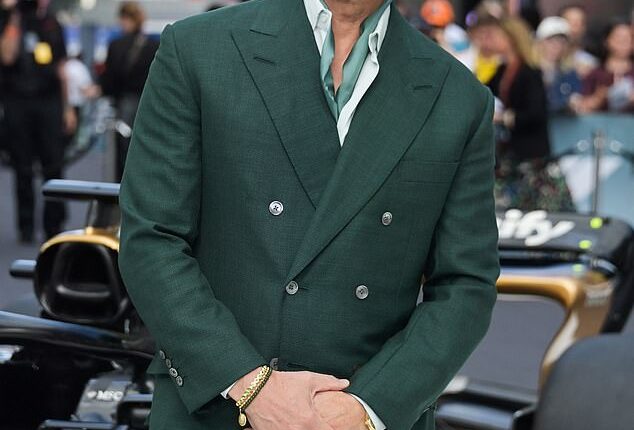 Brad Pitt looked dapper as he stepped out in a dark green suit for the European premiere of F1: The Movie in London on Monday