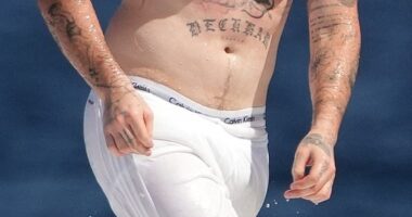 Brooklyn Beckham on holiday in Saint-Tropez, with his 'mamma's boy' tattoo on show over his heart