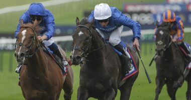 Ruling Court (white cap) won a strong edition of the 2,000 Guineas and has a big Derby chance